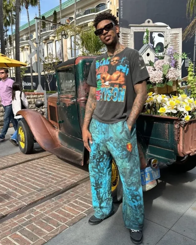 This image has an empty alt attribute; its file name is Nick-Young-2-640x800.webp
